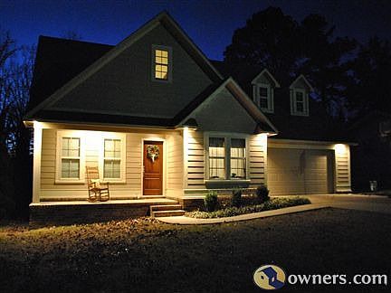 This house has attractive outdoor recessed lighting.