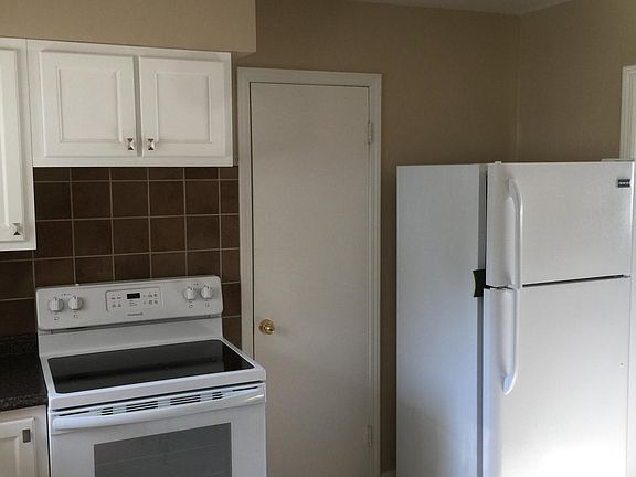 New self clean stove and newer refrigerator. 