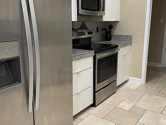 4th image of 5935 Woodridge Rock