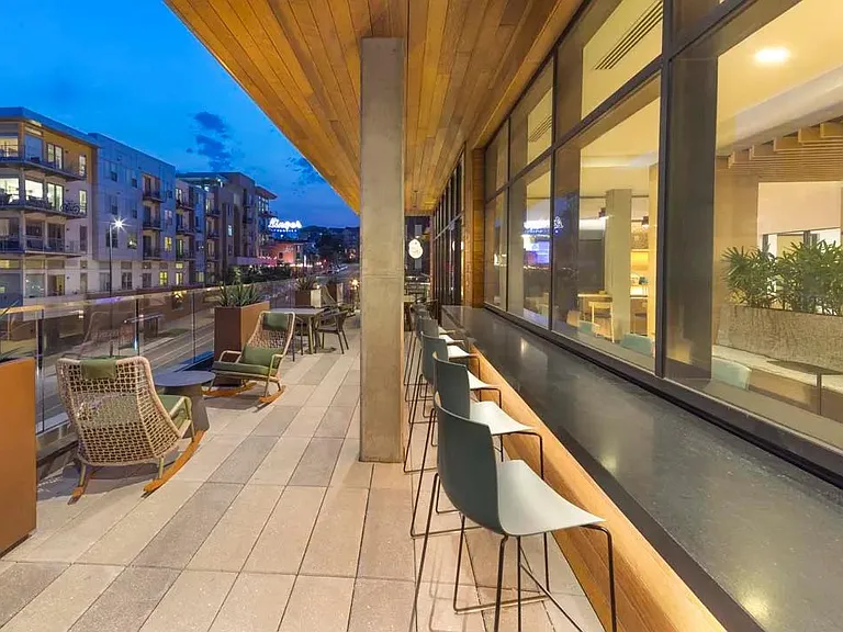 Work from home or enjoy your morning cup o' joe at the Modera LoHi indoor-outdoor lounge.