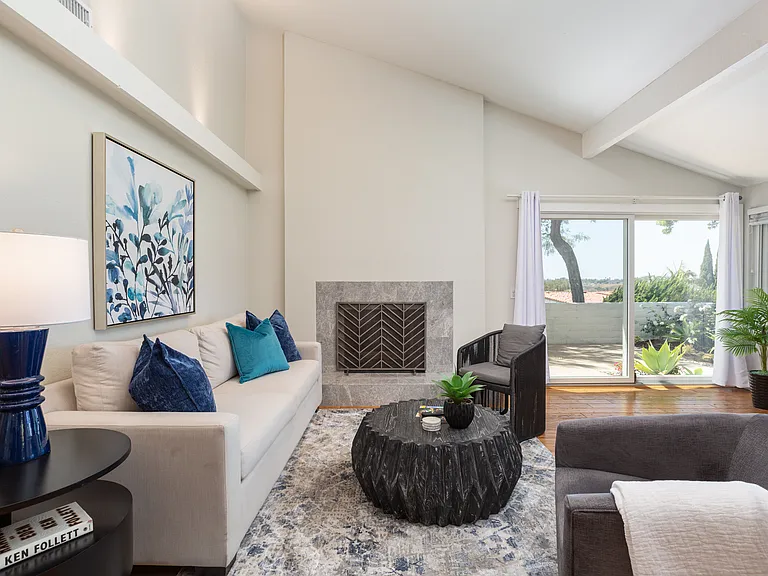 Feel the comfort of relaxing conversations with friends and family in the spacious living area with new windows allowing light and the beauty of nature just steps outside your door.