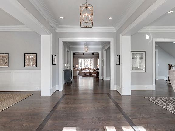 10 ft ceilings, oak floors, extensive trim and details!
