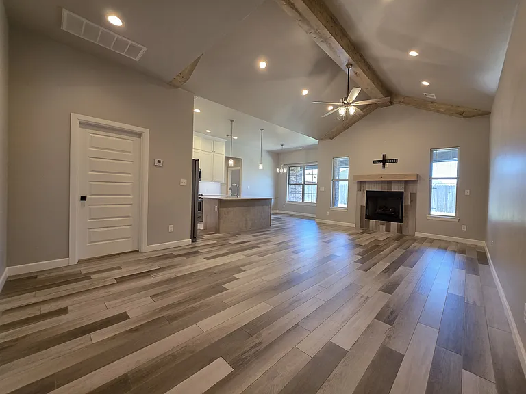 Welcome to 2603 Cloud Nine. The open concept living with seated kitchen island is warm & inviting