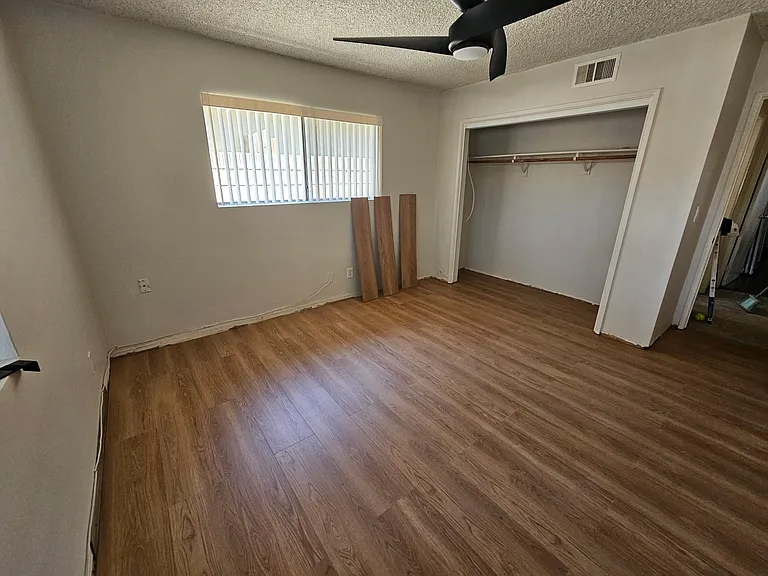 Bedroom with new paint and new flooring
