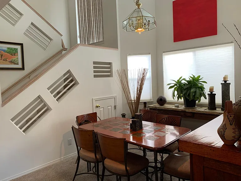 Formal dining room
Notice storage under stairs!