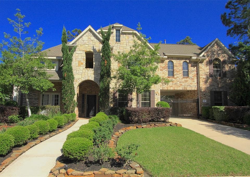 Stunning, Four Bedroom Home is conveniently located in Fall Creek with a tranquil back yard and connected patio.