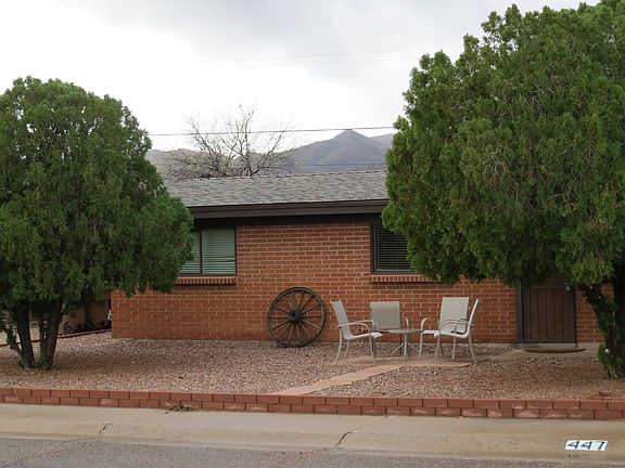Front yard has sm. patio