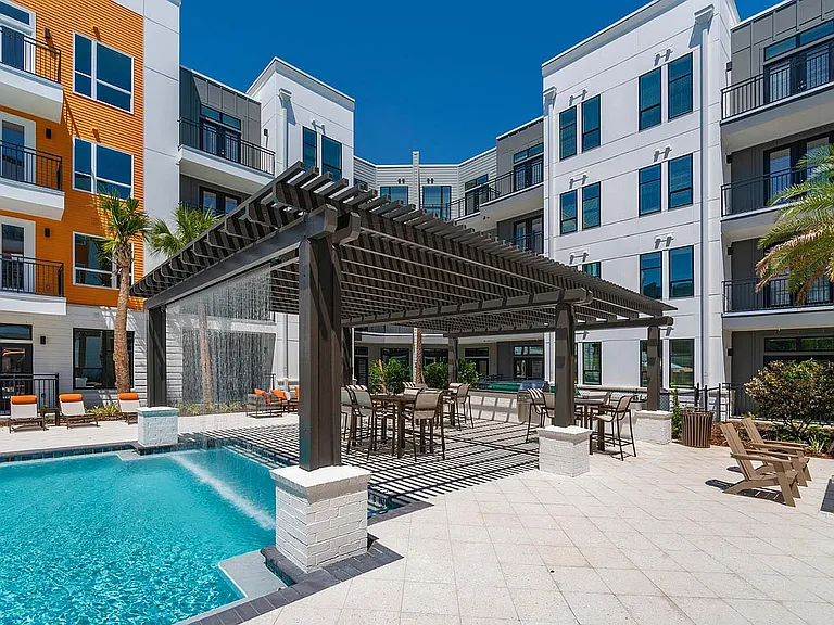 Relax and unwind in the stunning courtyard with a refreshing pool and lounge areas.