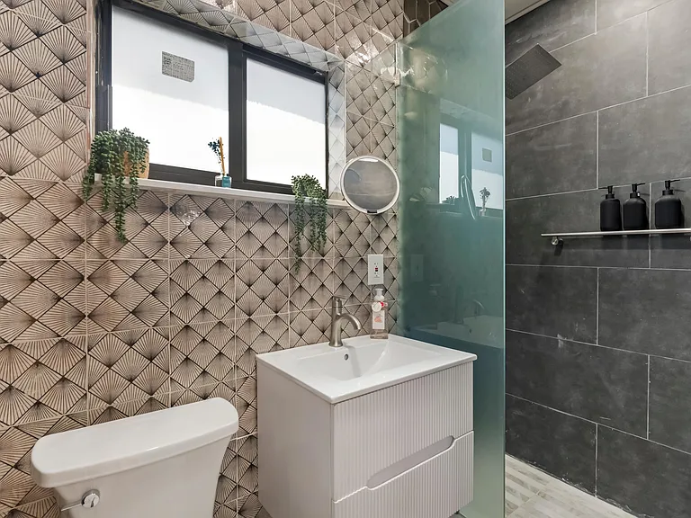 Huge powerful rain shower with heated towel rail