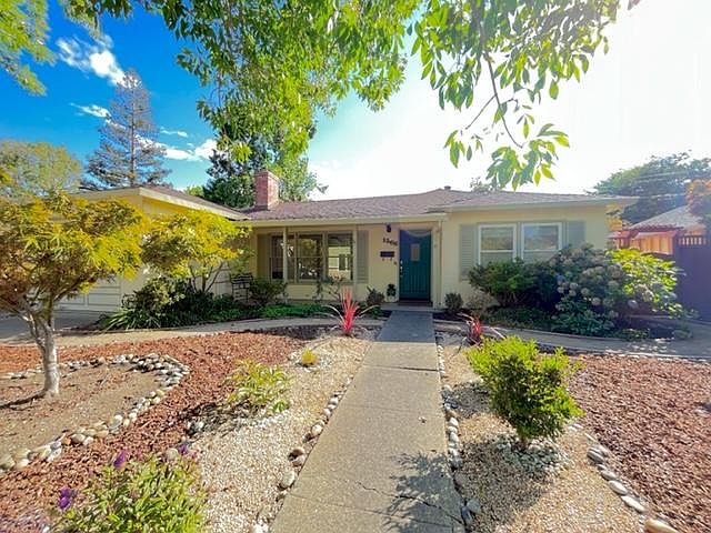 Large, landscaped, low-maintenance front yard and front porch