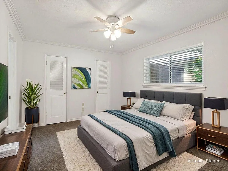 All bedrooms are located off the main hallway, with the Primary Bedroom ensuite tucked in the back corner for a bit more privacy.