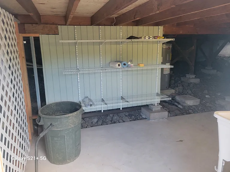 View of laundry room/storage room. It does have its own washer/dryer hook up