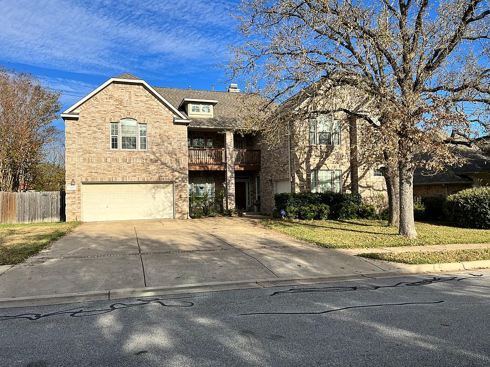 Three car garage, two main and one side. Extra wide lot.