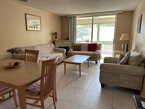 6021 NW 61st Ave #208 Photo 1