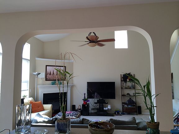 Open kitchen looks into living room