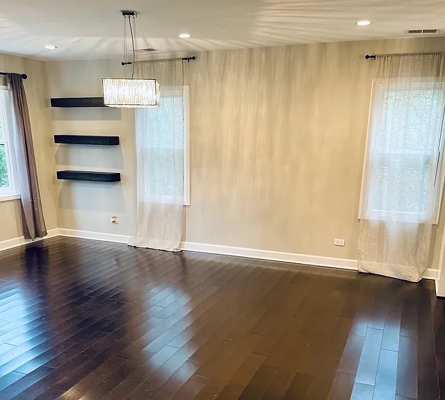 Open floor plan with living room, dining area and kitchen open.