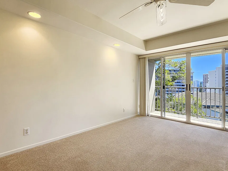 Living room with custom open lanai doors
