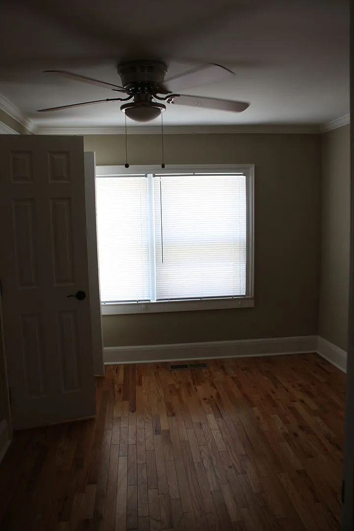 E 11th Tri-Plex — Photo 1
