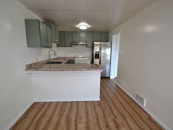 Large kitchen with a whole dining area.