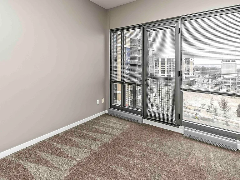 Large floor to ceiling windows let in abundant natural light.