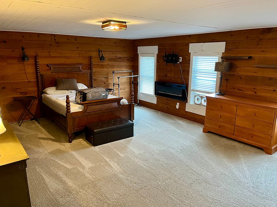 Bedroom Area(This room is a brand new addition. Wall heater, mount for a TV, 2 dressers, queen size bed)