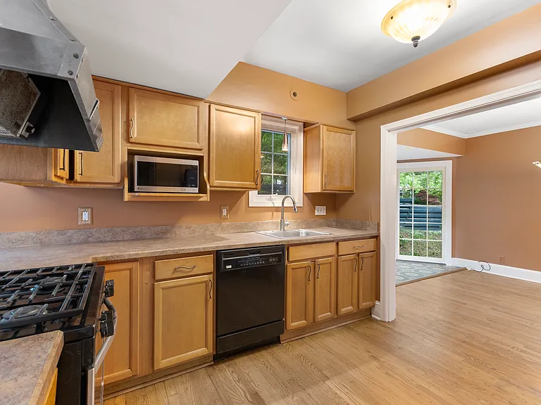 Bright kitchen workspace and easy access to the rest of the main floor.