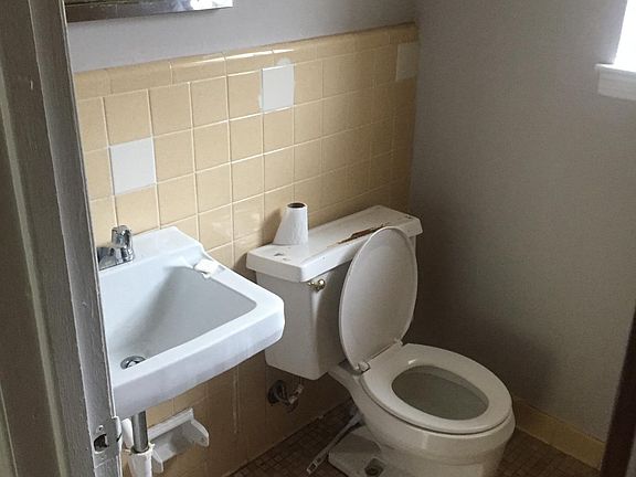 Charming bathroom with tub and shower! 