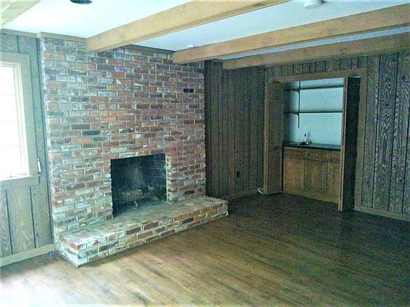 Family room could be a great office. Another private office is located on the main level. Both with fireplaces.