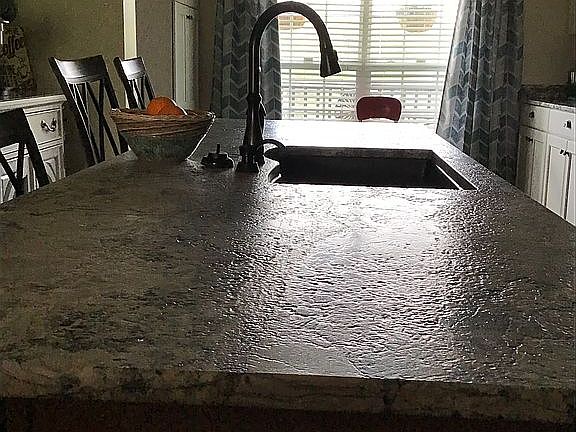 Lg leathered granite island