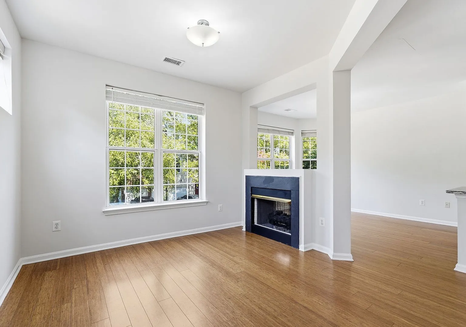 Bright 2BR/2BA with Fireplace, Balcony, Pool & Parking! — Photo 3
