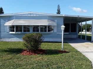 961 Frangi Pani Dr, Barefoot Bay, FL 32976