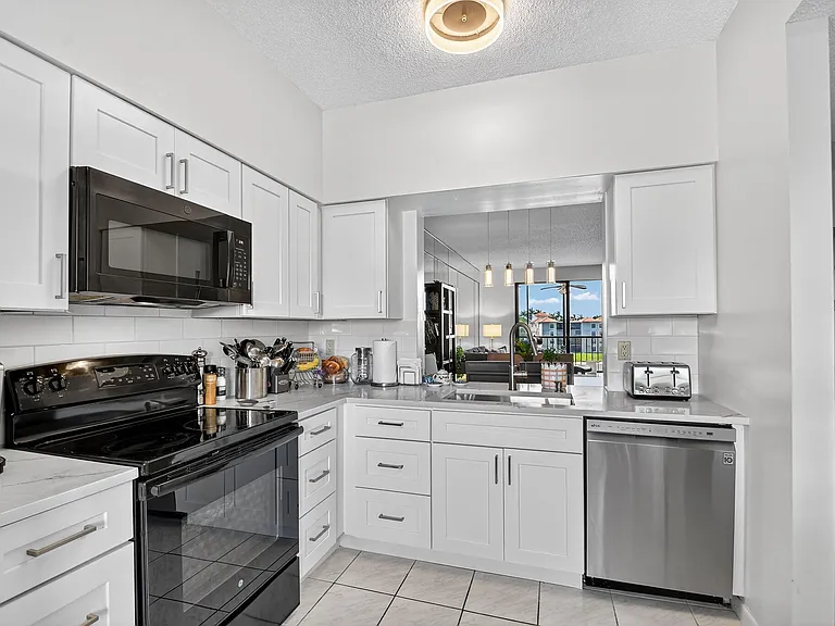 6193 Pointe Regal Cir #402 — Photo 9