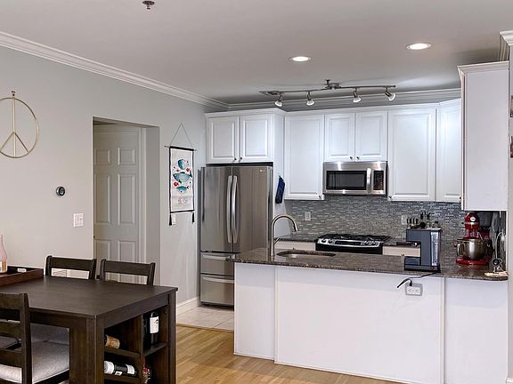 Open Kitchen, Granite Kitchen Counter and Recessed Lighting.