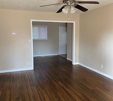 Living rm open to dining area all freshly painted