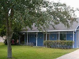 This country home features an attached oversized 2 car garage with carport and double driveway.