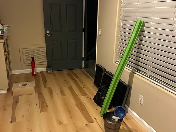 Kitchen to entrance across dining room