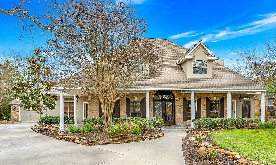 Welcome home- 19 Edgewater Circle- this traditional style home with inviting front porch is situated on a cul-de-sac lot with no rear neighbors.