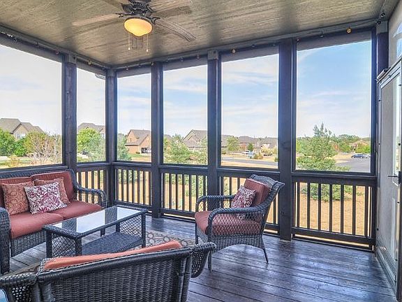 Relax on screened-in-porch.