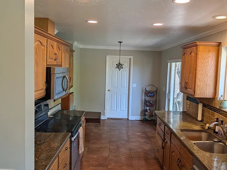 galleyway kitchen door leading to the mudroom/laundry room