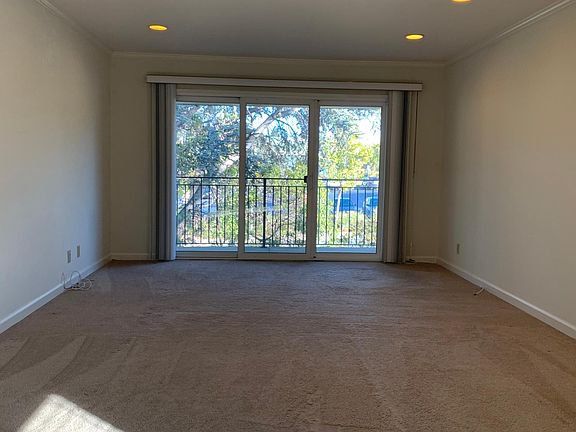 Spacious, bright living space leading out to your private balcony!