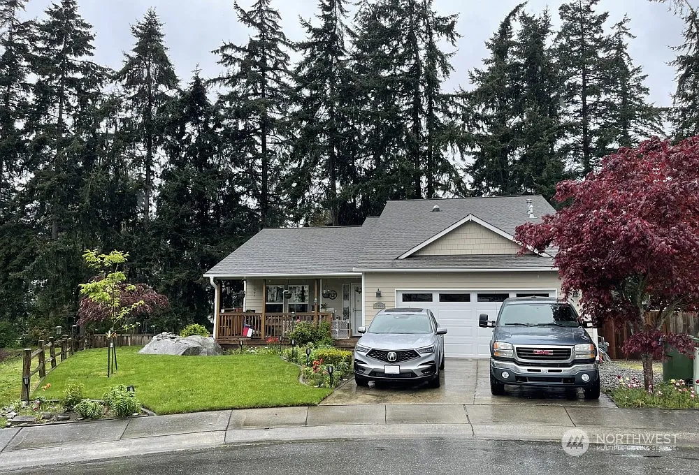1298 NE Riksen Way photo 1