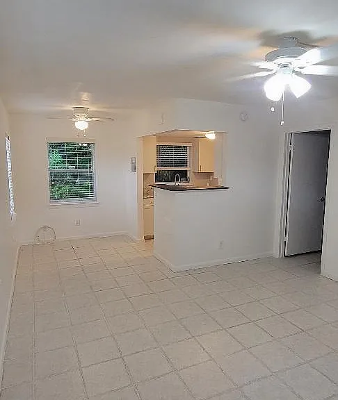 View from front door towards kitchen and dining area.