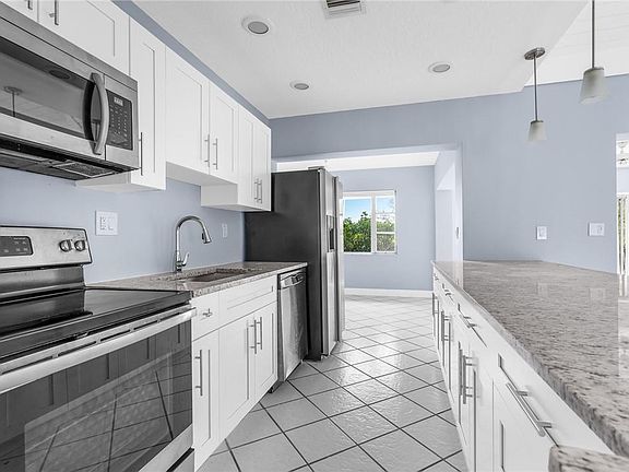 Kitchen with an extended island.