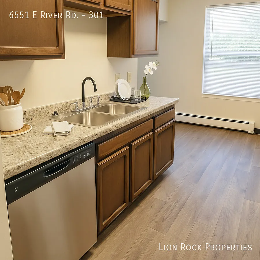 Building Photo - 6551 E River Rd #301