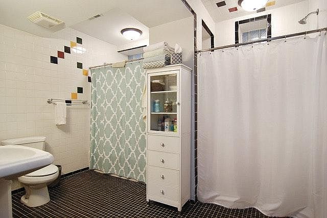 Large Bathroom. Two showers. One bathtub with with Shower an