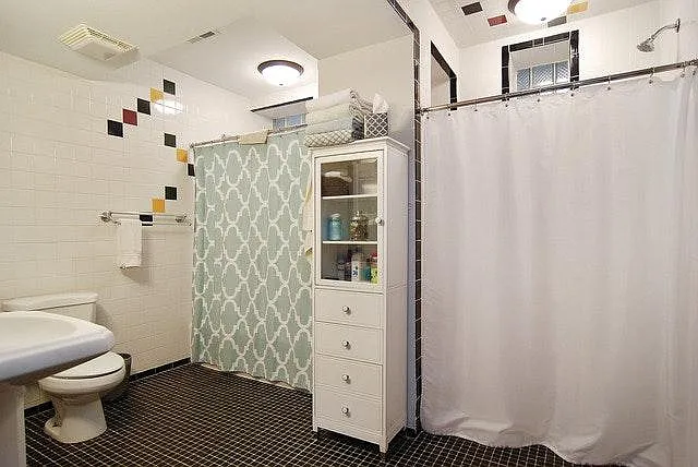 Large Bathroom. Two showers. One bathtub with with Shower an