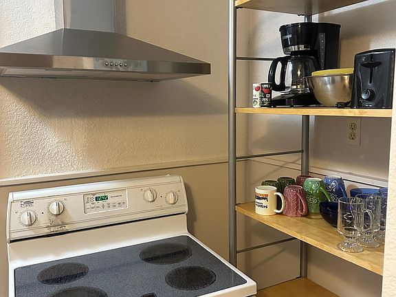 Stove and supplies for kitchen
Coffee maker, dishes, cups, etc.