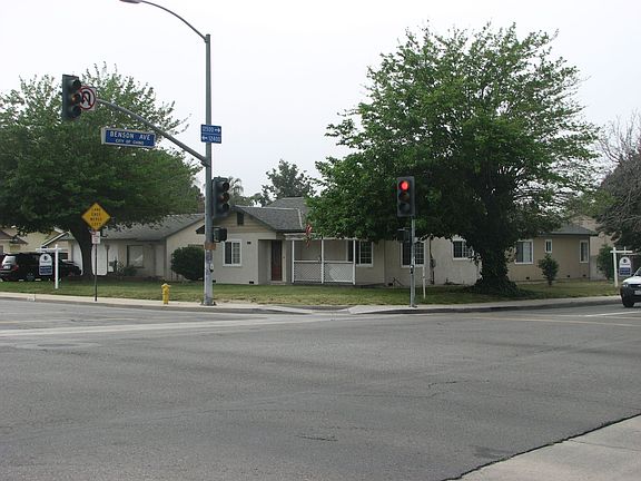 Almost half an acre (2 lots) drive ways on both sides.
