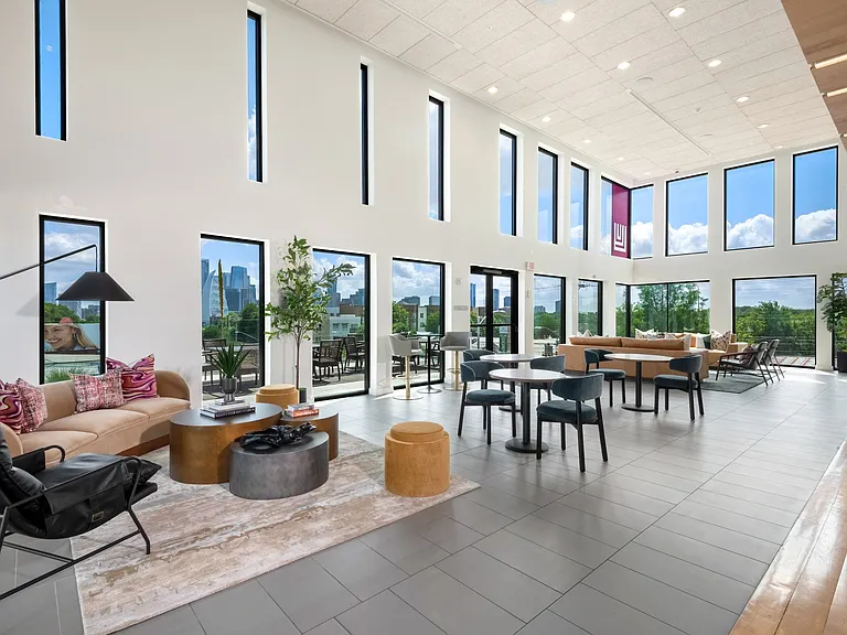 Resident Lounge with Extensive Seating and Downtown Views
