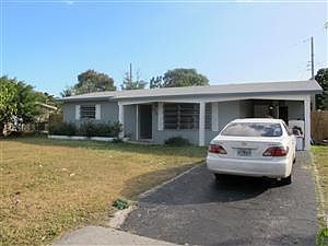 1st image of 810 NE 51st Ct